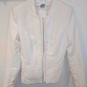 White, leather lapel blazer